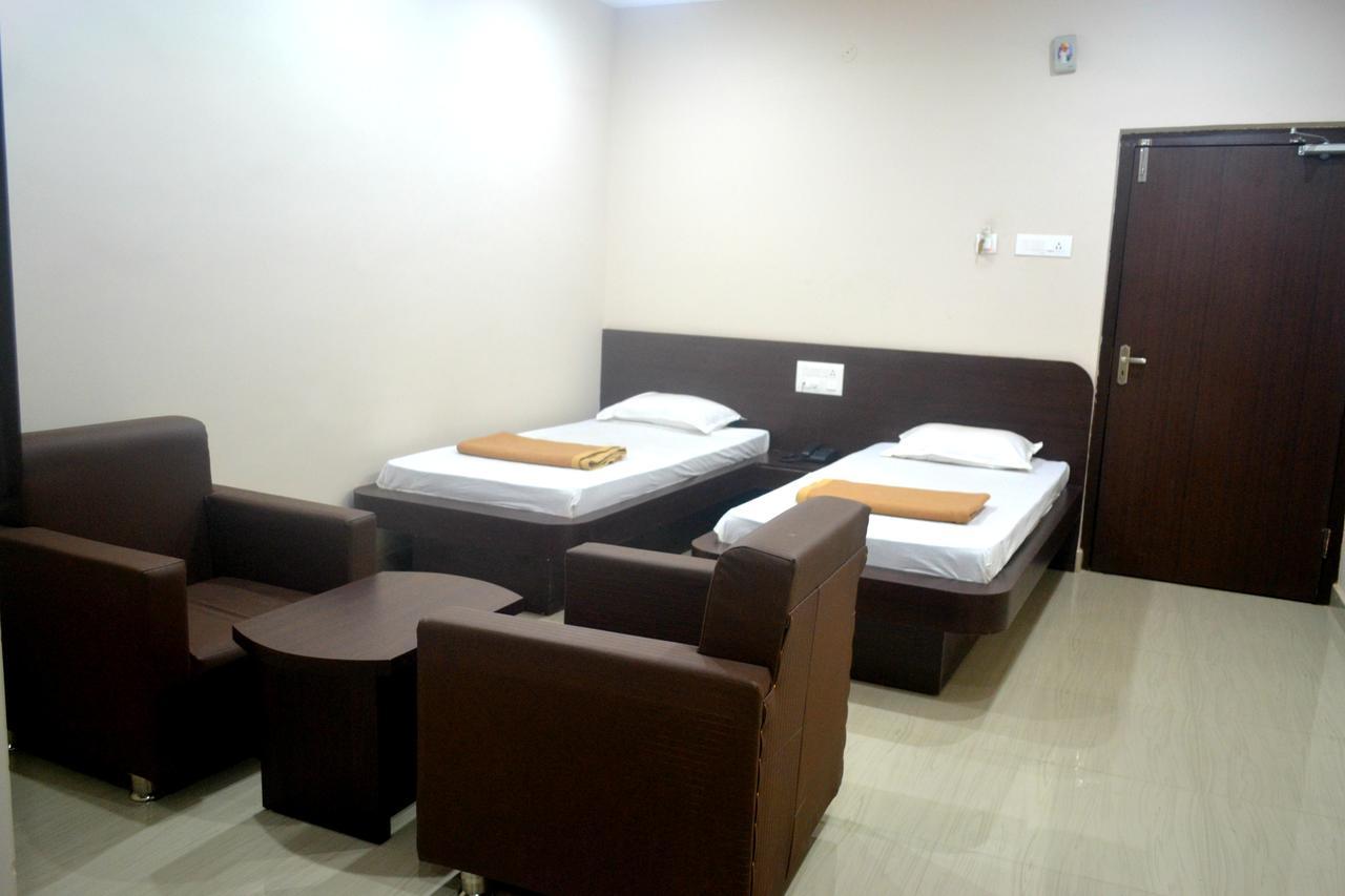 Hotel Bhammars Balangir Quarto foto